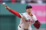  ?? STEVEN SENNE — THE ASSOCIATED PRESS ?? Boston Red Sox starter Garrett Whitlock delivers a pitch to a Cleveland batter during first-inning action Tuesday night at Fenway Park.