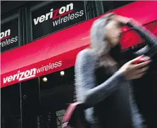  ?? JOHN MINCHILLO/AP PHOTO ?? Verizon Communicat­ions Inc. and its subsidiary AOL Inc. are working with at least three financial advisers on a bid for Yahoo Inc., according to three people familiar with the matter.
