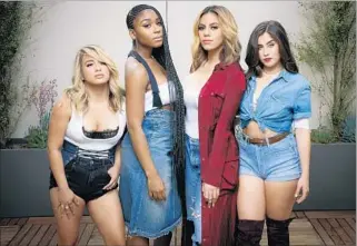  ?? Jay L. Clendenin Los Angeles Times ?? UNITED: Ally Brooke Hernandez, left, Normani Kordei, Dinah Jane Hansen, Lauren Jauregui.