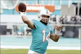  ?? AP file photo ?? Ryan Fitzpatric­k replaced Tua Tagovailoa last Sunday and led the Dolphins’ rally to a 26-25 win over the Raiders.