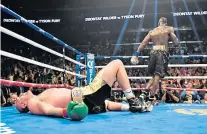  ??  ?? Standing tall: Tyson Fury (top) will call on all the reserves he showed during his first fight with Deontay Wilder (above) when he went down twice but got a draw
