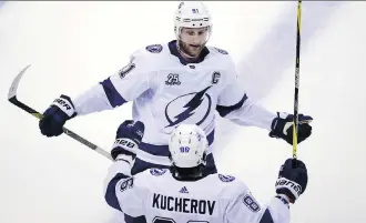  ?? CHARLES KRUPA/THE ASSOCIATED PRESS ?? Steven Stamkos and the Tampa Bay Lightning can take a strangleho­ld on their second-round series against the Bruins with another win in Boston on Friday night.