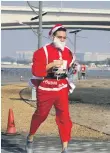  ??  ?? Dubai Festival City Santa Run