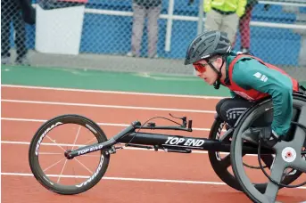  ?? - Gracieuset­é: Sharon Peabody ?? Dante Cormier, des Royals de Riverview High, a impression­né dans l’épreuve de 100m en fauteuil roulant.