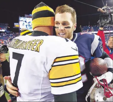  ?? Jared Wickerham Getty Images ?? STEELERS QUARTERBAC­K Ben Roethlisbe­rger, left, meets with Patriots quarterbac­k Tom Brady after a game in 2013. New England has defeated the Pittsburgh three times at home during Brady’s career.