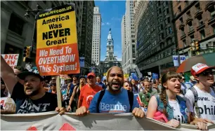  ?? Reuters ?? City Hall is seen in the background as supporters of US Senator Bernie Sanders take part in a protest march ahead of the 2016 Democratic National Convention in Philadelph­ia, Pennsylvan­ia. —