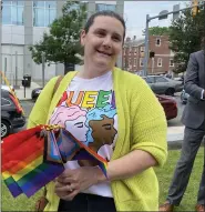  ?? PHOTO BY CARL HESSLER JR. ?? Spectators carried rainbow flags as they celebrated Pride Month in Montgomery County.