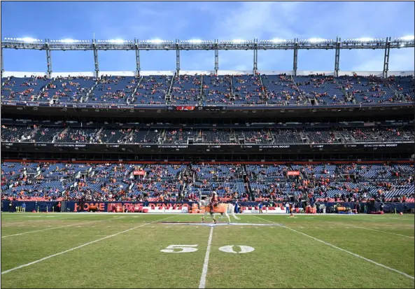  ?? RJ SANGOSTI — THE DENVER POST ?? With less than a half hour to kick off, many of the seats at Empower Field are still empty before the Broncos take on the Arizona Cardinals on Sunday.