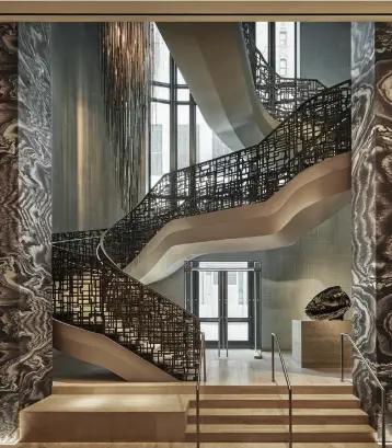 ?? (Christian Horan/Four Seasons/TNS) ?? THE GRAND STAIRCASE at the Four Seasons Hotel New York Downtown.
