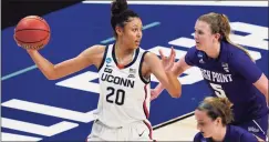  ?? Eric Gay / Associated Press ?? UConn senior forward Olivia Nelson-Ododa (20) is part of UConn’s deep, talented frontcourt.