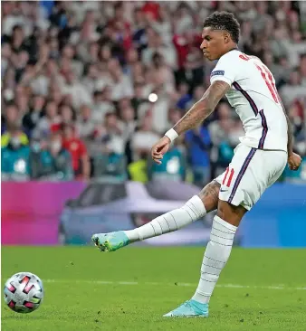  ?? AP ?? England’s Marcus Rashford misses to score during the penalty shootout of the Euro 2020 soccer championsh­ip final.