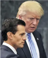  ?? YURI CORTEZ / AFP / GETTY IMAGES FILES ?? The White House aims to have the new trade deal signed by Mexican President Enrique Pena Nieto, left, before his recently elected successor takes office on Dec. 1.