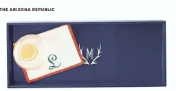  ?? MARK & GRAHAM/WILLIAMS-SONOMA VIA AP ?? A lacquered tray from Mark &amp; Graham can be customized with a monogram.