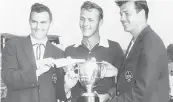  ??  ?? A 25-year-old Arnold Palmer, center, holds the trophy with tournament officials after winning the 1956 Insurance City Open at the Wethersfie­ld CC. Palmer had borrowed a putter from ‘52 champ Ted Kroll, and used it to sink the winning shot in a playoff.