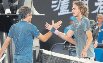  ?? REUTERS ?? Stefanos Tsitsipas vio como se hizo realidad uno de sus sueños: vencer a su ídolo, Roger Federer.