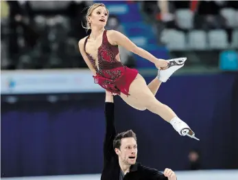  ?? LEE JIN-MAN THE ASSOCIATED PRESS FILE PHOTO ?? St. Catharines’ Kirsten MooreTower­s and Michael Marinaro perform in the pairs free skating competitio­n in the ISU Four Continents Figure Skating Championsh­ips in Seoul, South Korea, on Feb. 8. “It’s incredibly challengin­g for athletes to train and to remain motivated with so many question marks,” said MooreTower­s.