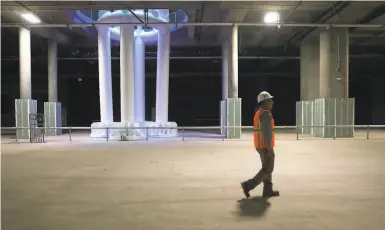  ?? Liz Hafalia / The Chronicle 2018 ?? Designer engineer Skip Sowko shows the train box, a cavernous basement of the Transbay transit center, for trains to — someday — pull in from the South Bay. Now only buses will run in and out of the transit hub.