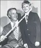  ?? Associated Press ?? GORDIE HOWE has some fun with 11-year-old Wayne Gretzky during a dinner in Canada in 1972.