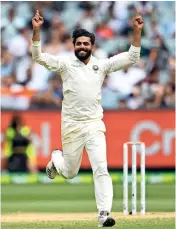  ?? AFP ?? Ravindra Jadeja jubilant after dismissing Tim Paine during day four of the third Test in Melbourne. —