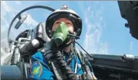  ?? PROVIDED TO CHINA DAILY ?? Hao Jingwen goes through an air combat training session.