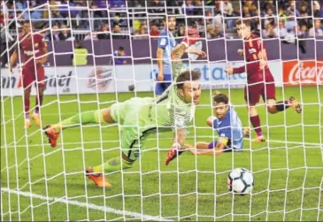  ?? AP ?? Lastplaced Malaga lost 20 at home, the victory boosting Barcelona ahead of their Champions League second leg tie against Chelsea.