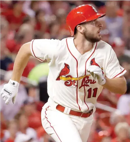  ?? By Jeff Roberson, AP) (Photo ?? St. Louis Cardinals’ Paul DeJong watches his solo home run during the seventh inning on Saturday against the Atlanta Braves.