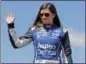  ?? CHARLES KRUPA — ASSOCIATED PRESS FILE ?? Danica Patrick waves prior to the NASCAR Cup Series auto race at the New Hampshire Motor Speedway in Loudon, N.H., in July.