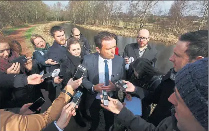  ??  ?? Detective Superinten­dent Pat Campbell talks to reporters at Monklands Canal at Carnbroe near Coatbridge. Police teams, top, are now searching for missing schoolgirl Moira Anderson Pictures: Colin Mearns