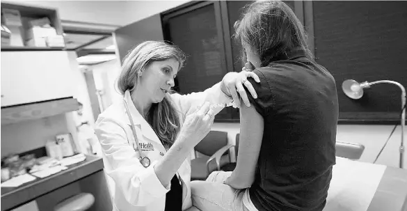 ?? Joe Ra edle / Gett y Imag es ?? According to a Journal of the American Medical Associatio­n safety analysis, the Gardasil HPV vaccine is no more harmful than any other.