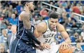  ?? JOHN RAOUX/AP ?? Giannis Antetokoun­mpo and the Bucks will try to extend their current 14-game win streak by beating Terrence Ross and the Magic on Monday.