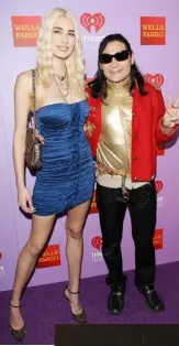  ??  ?? CENTRE: Corey Feldman and his wife Courtney Anne arrive at the iHeart80s Party in 2016 in Inglewood, California