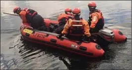  ??  ?? Search: A police team on the canal after the tragedy yesterday