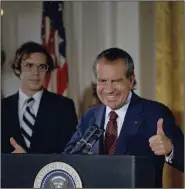  ?? (AP file photo) ?? As Watergate complicati­ons arose in the summer of 1972, former president Richard Nixon, seen here with son-in-law David Eisenhower during Nixon’s 1974 farewell speech to his staff, worked to assemble a list of his all-time greatest baseball players for an article that appeared in newspapers across the country 50 years ago this week.