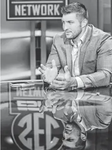  ?? CHUCK BURTON, AP ?? Tim Tebow says his SEC Network job is “a great opportunit­y.”