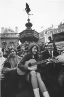  ?? Phillip Harrington/Alamy ?? Bunyan playing guitar and singing at Piccadilly Circus, 1966. Photograph: