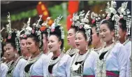 ?? WU DEJUN / FOR CHINA DAILY ?? Members of the Dong ethnic group sing Grand Song.