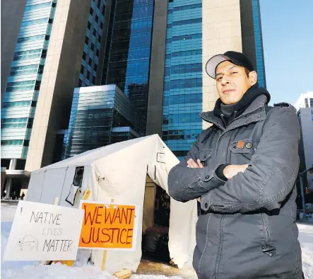  ?? DARREN MAKOWICHUK ?? Garret Smith and other Indigenous men have set up a tent across from the Calgary Courts and plan to be there indefinite­ly.