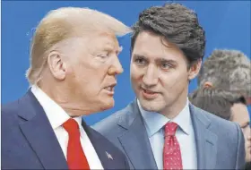  ?? Frank Augstein The Associated Press ?? President Donald Trump and Canadian Prime Minister Justin Trudeau talk prior to a NATO meeting last week.