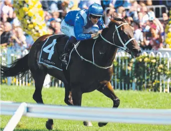  ?? Picture: AAP IMAGE ?? Hugh Bowman rides Winx to a world record 17th Group 1 win at Rosehill yesterday