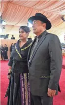  ?? ROBERT HANASHIRO/USA TODAY ?? Osage singer Scott George and his wife, Taveah George, are pictured March 10 on the red carpet at the 96th Oscars at the Dolby Theatre at Ovation Hollywood in Los Angeles.