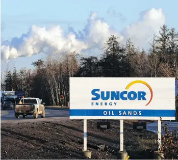  ?? MARK RALSTON/AFP/GETTY IMAGES FILES ?? Calgary-based Suncor is seeking regulatory approval to build an oilsands project north of Fort McMurray called Lewis. Suncor sees it as part of its next wave of growth.