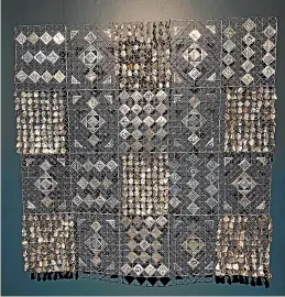  ??  ?? Waiwhetu¯ by Veranoa Hetet, made for her mother, Erenora, with metal, paua and glass as a contempora­ry woven quilt. Exhibited as part of Creating Potential at The Dowse.