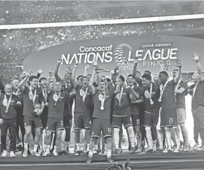  ?? CLICK THOMPSON/GETTY IMAGES ?? The United States Men’s National Team celebrates Sunday after beating Mexico in the Nations League final in Arlington, Texas.