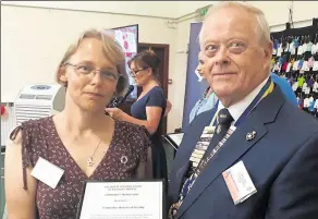  ??  ?? Tor Millard from Frittenden with Richard Cast from the Royal British Legion. She was among several people being honoured for her support