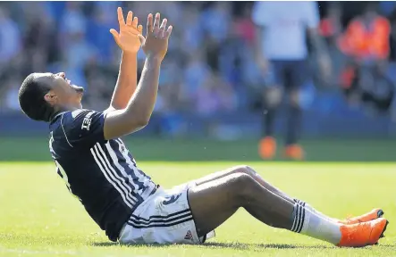  ??  ?? > Anguish for striker Salomon Rondon as West Brom drop out of the Premier League into the Championsh­ip