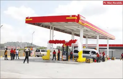  ?? ?? Meru franchise opened its fourth service station yesterday along Cripps Road in Granitesid­e, Harare
Pic: Hilary Maradzika