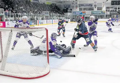  ?? Picture: Derek Black. ?? Dundee Stars’ Kevin Dufour sees an attempt saved by Clan goalie Patrick Killeen at Dundee Ice Arena on Saturday.