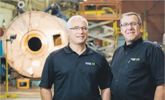  ??  ?? Yves Lacroix (à gauche) et Martin Magny ont investi 8 millions de dollars pour acquérir le fonds de commerce et les équipement­s de GLV Fabricatio­n (rebaptisée FAB 3R), en compagnie de leur associée Chantal Rochette.
