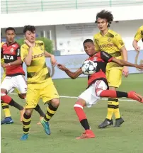  ??  ?? Brazil’s Flamengo outplayed German side Dortmund 8-2 to set up a title clash with Real Madrid who beat PSV Eindhioven 1-0.