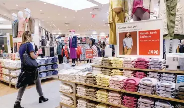  ?? — Reuters ?? People shop at an H&M store during the grand opening of the The Hudson Yards developmen­t, a residentia­l, commercial, and retail space on Manhattan’s West side in New York City, New York, US.